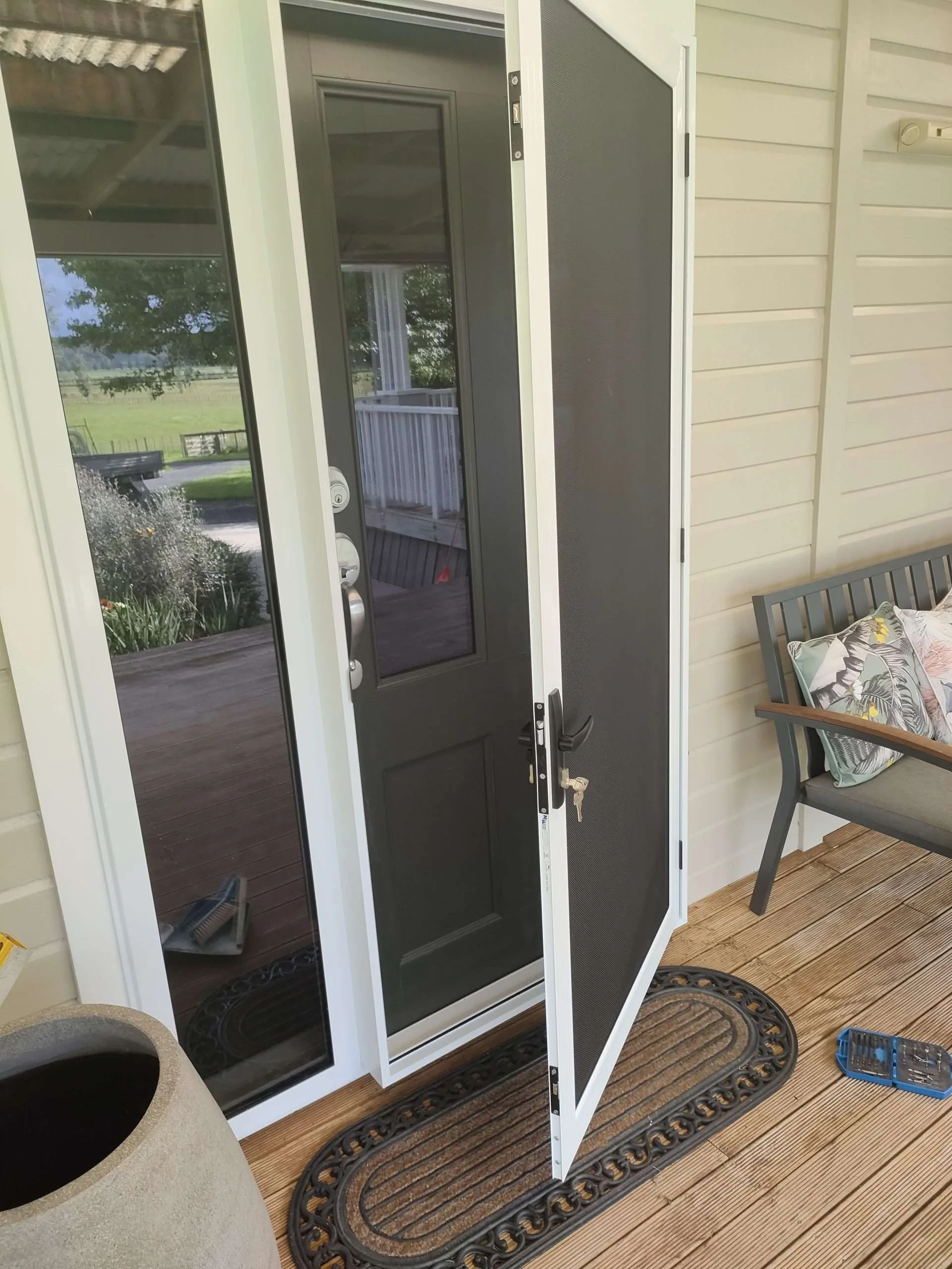 Installed security screen door
